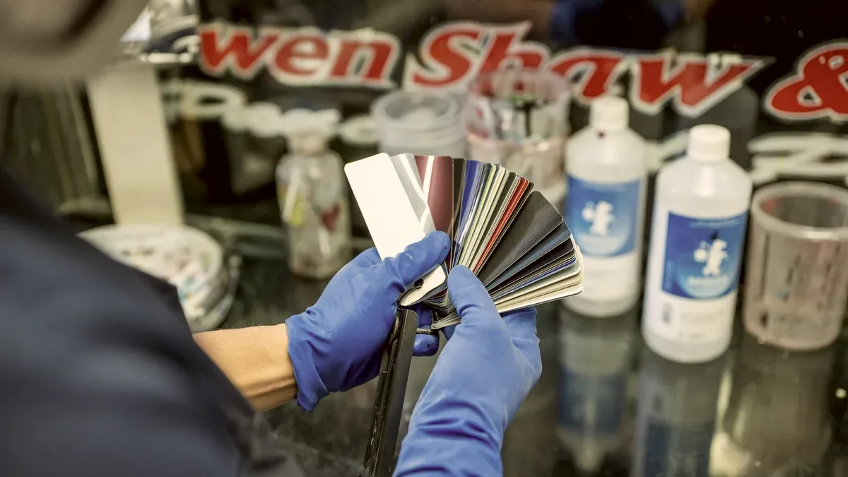 Colour matching in the paint room at Fix Auto Mt Wellington