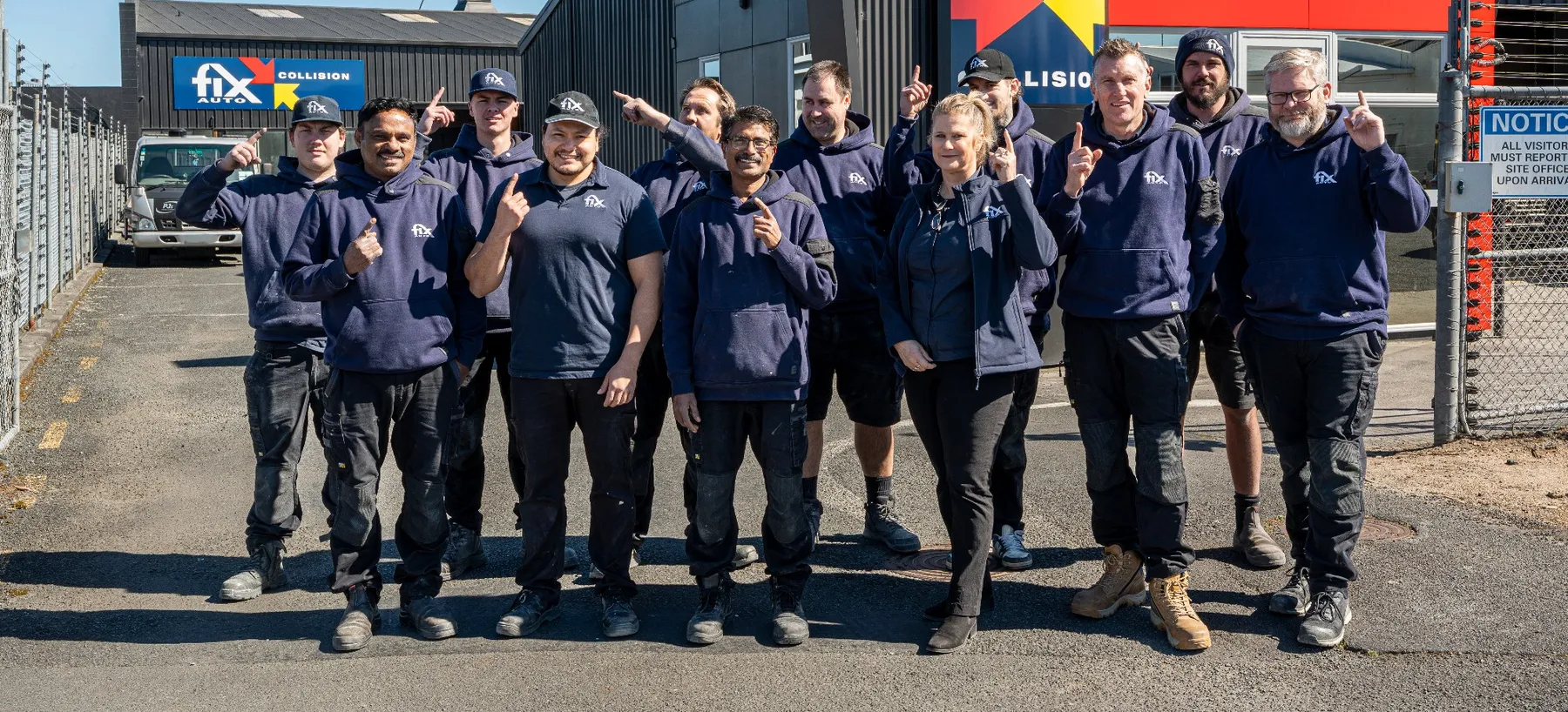 The Fix Auto Hamilton South team outside the workshop