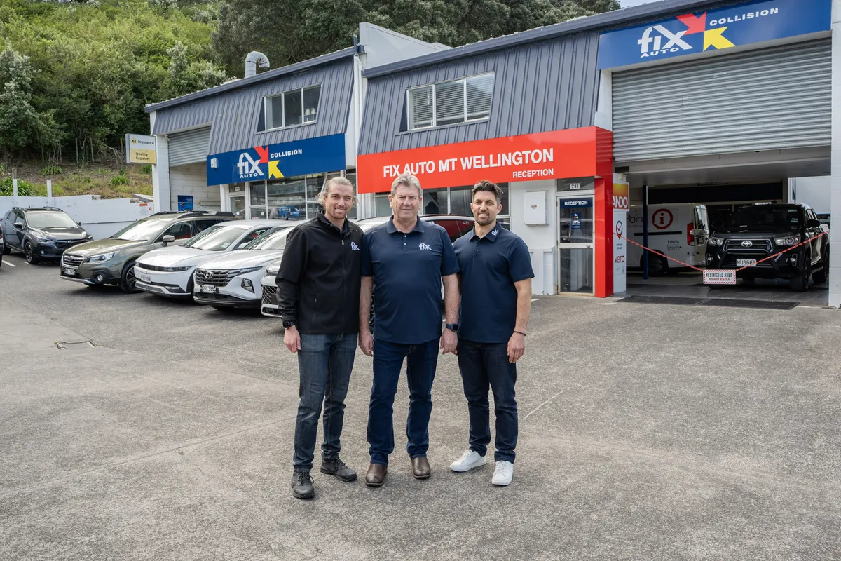 The owners of Fix Auto Mt Wellington outside the workshop on Portage Road